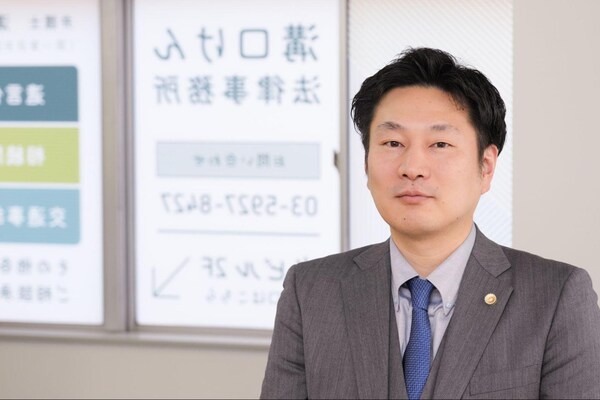 溝口 懸弁護士のインタビュー写真