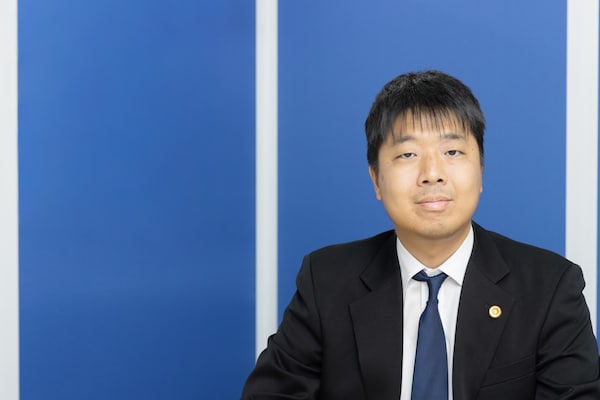 田本 雅樹弁護士のインタビュー写真