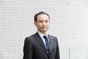 山田 穂積弁護士のインタビュー写真