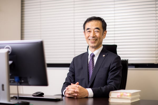 下村 訓弘弁護士のインタビュー写真